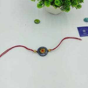 GREY GOLDEN CIRCLE RAKHI