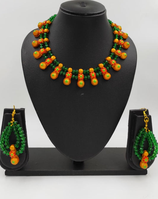 Red Golden with green crystal look beads !